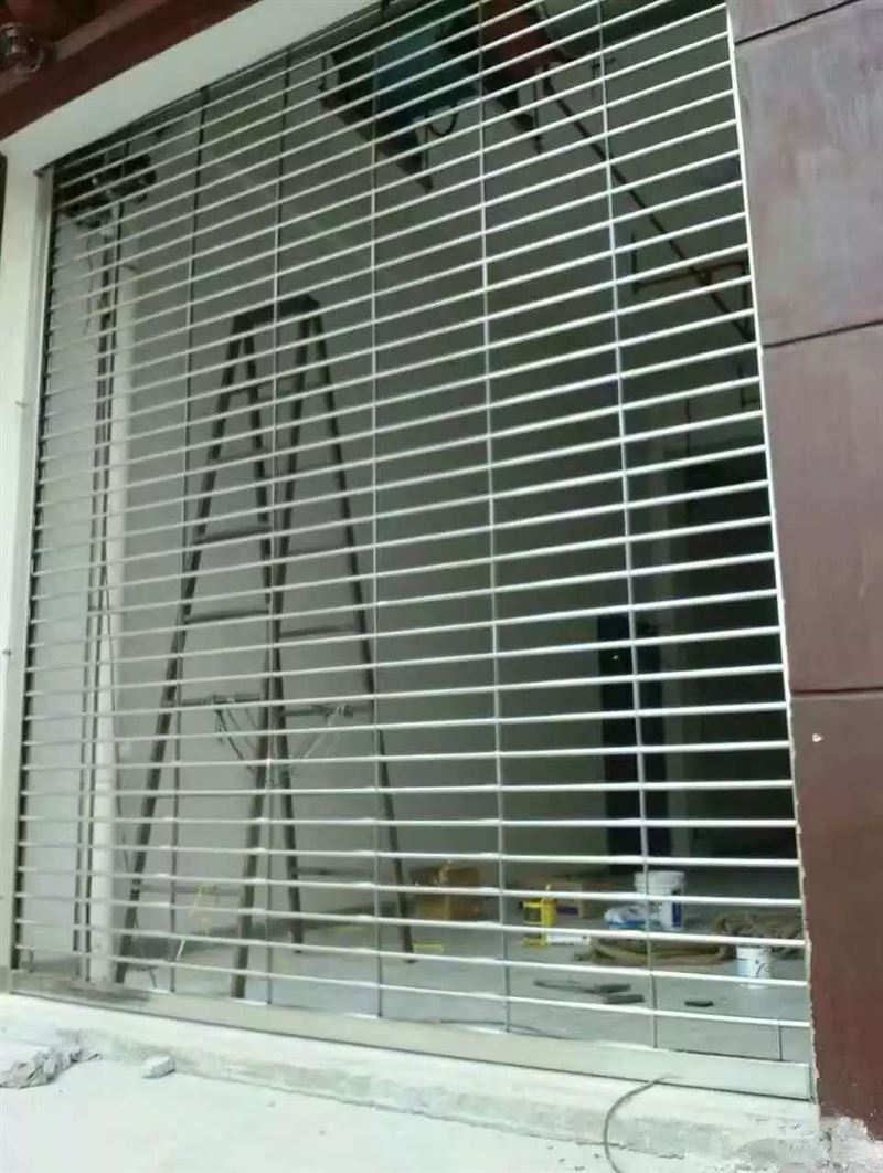 深圳专业玻璃自动门、电动卷帘门、折叠门安装维修承接